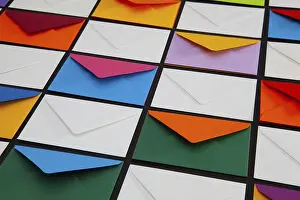 Colorful Envelopes Imprime: Composition with white and colored envelopes on the table