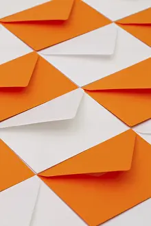 Empty Office Desk Imprime: Composition with white and orange envelopes on the table