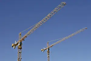Grúas Imprime: Dos grúas de construcción.
