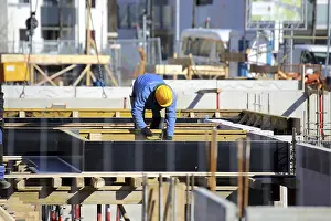 House Building Imprime: Construction work on the foundations of a large apartment building