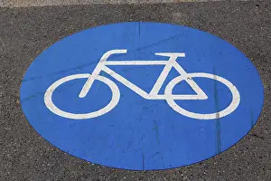 Cycle Path Marking Imprime: Cycle path marking on a pavement