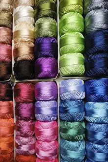 Handicraft Store Imprime: Different color threads on rows in the store