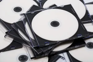CD Storage Imprime: Disks cd in boxes as a background