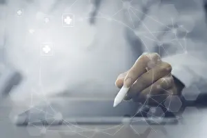 Digital Healthcare System Imprime: Doctor using digital tablet virtual screen