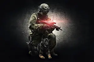 German Shepherd Breed Imprime: Dog handler posing in the studio with a trained shepherd