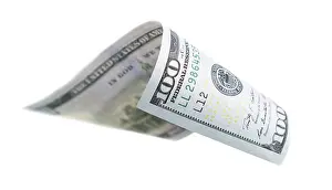 Currency Concept Image Imprime: One hundred dollar bill falling or floating on empty background