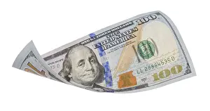 US Dollar Note Imprime: One hundred dollar bill falling or floating on empty background