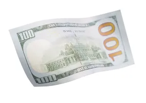 US Dollar Note Imprime: One hundred dollar bill falling or floating on empty background