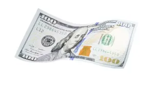US Dollar Note Imprime: One hundred dollar bill falling or floating on empty background