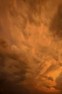 Dramatic Clouds Imprime: Dramatic clouds in the sky, after sunset