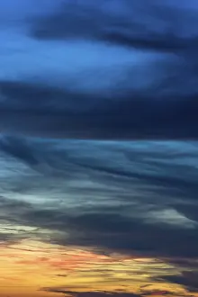 Dramatic Evening Atmosphere Imprime: Dramatic dark clouds in the evening sky
