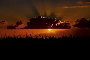 Mauritius Sunset Imprime: Dramatic sunset behind clouds, Chebel