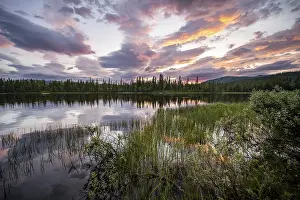 Deserted Waterfront Norway Imprime: Dramatic sunset by the river Namsen with reflection