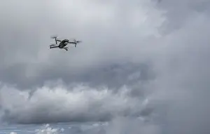 Upper Bavaria Aerial View Imprime: Drone with camera flies in front of clouds