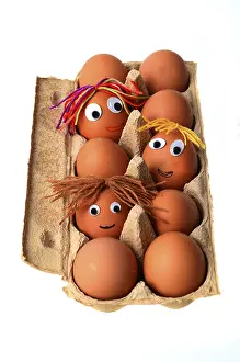 Funny Food Photography Imprime: Eggs with faces in an egg box
