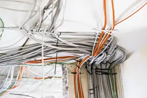 Electrical Power Supply Line Imprime: Electric cable on the ceiling of a flat