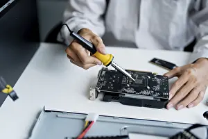 Computer Motherboard Imprime: IT Engineer installing Hardware Equipment Development Facility Engineer Maintenance computer Motherboard Electronic