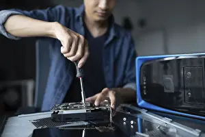 Computer Motherboard Imprime: IT Engineer installing Hardware Equipment Development Facility Engineer Maintenance computer Motherboard Electronic