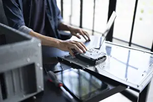 Computer Hardware Repair Imprime: IT Engineer installing Hardware Equipment Development Facility Engineer Maintenance computer Motherboard Electronic