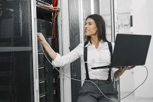 Computer Hacking Imprime: IT expert checking supercomputer server