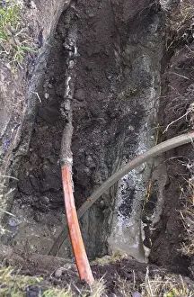Digital Data Transmission Imprime: Fibre optic cable is pulled through the ground by a drill head
