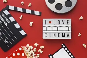 Red Background Concept Image Imprime: Flat lay cinema elements red background