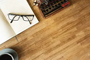 Symbolic Picture Imprime: Glasses on the notebook on the table