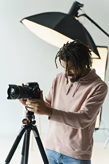 Single Lens Reflex Camera Imprime: Grapher preparing camera