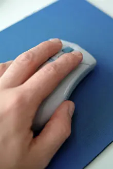 Electronic Technology Imprime: Hand on computer mouse
