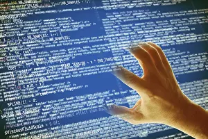 Data Security Threats Imprime: Hand grabbing a computer code, hacking and computer crime concept