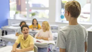 Education Concept Image Imprime: High angle boy presenting class