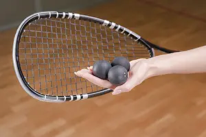Squash Player Imprime: Image of racket and three squash balls