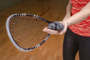 Squash Racket Imprime: Image of racket and three squash balls