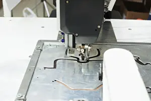 Handicraft Industry Equipment Imprime: Image of sewing machine stitching on patterns