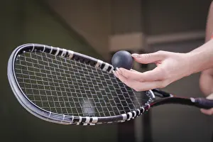 Tennis Equipment Imprime: Image of a woman's hand with a squash racket