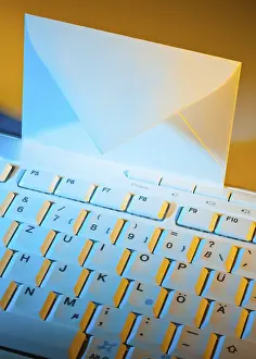 Computer Keyboard Imprime: The keyboard of a computer and an envelope