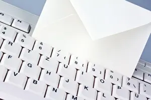 Computer Keyboard Imprime: The keyboard of a computer and an envelope