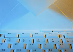 Computer Keyboard Imprime: The keyboard of a computer and an envelope