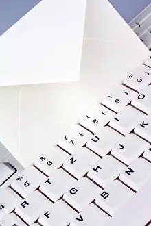 Computer Keyboard Imprime: The keyboard of a computer and an envelope