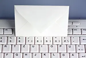 Computer Keyboard Imprime: The keyboard of a computer and an envelope