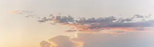 Cloudy European Scenery Imprime: Large pink cloud at sunset in spring