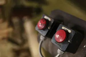 Industrial Building Architecture Imprime: Machine control panel with two red buttons