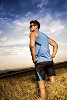 Recreational Activity Photo Imprime: Man jogging through the fields