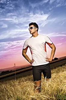Athletic Man Imprime: Man jogging through the fields