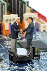 Electronic Technology Imprime: Two managers on computer board