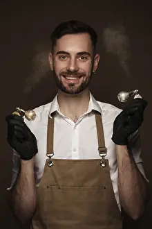 Nail Technician Imprime: Manicur master man in working form with tools in hand