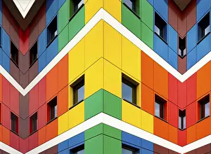 Educational System In Europe Imprime: Multi-colored facades of the school with black window frames