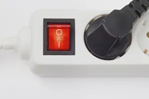 Power Supply Socket Imprime: Multiple outlet socket, on/off switch glowing red