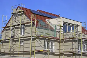 Residential Building Shell Construction Imprime: New building with completed basic rendering of the exterior facade New building with completed basic rendering of
