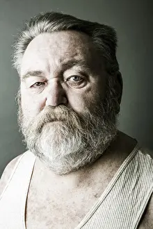 European Head Shot Imprime: Obese senior with a full beard and in his undershirt